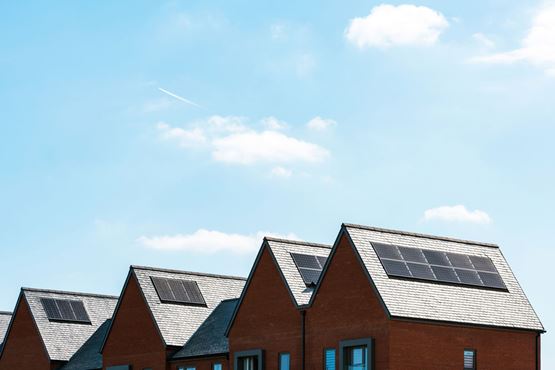 Photo of new homes with solar panels