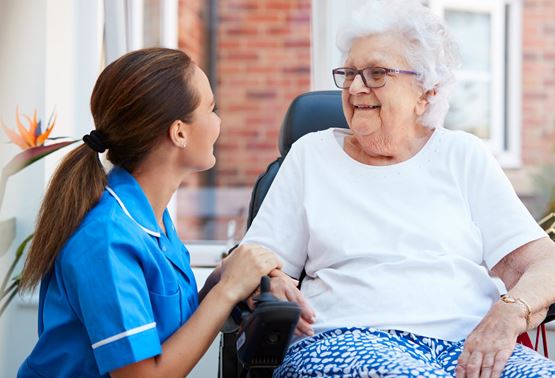 Nurse and elderly woman