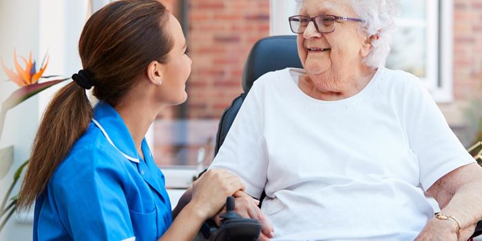 Nurse and elderly woman