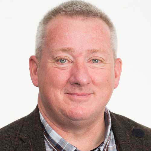 Photo of Jon Lord who is Chief Executive of Bolton at Home and Chair of the Greater Manchester Housing Partnership