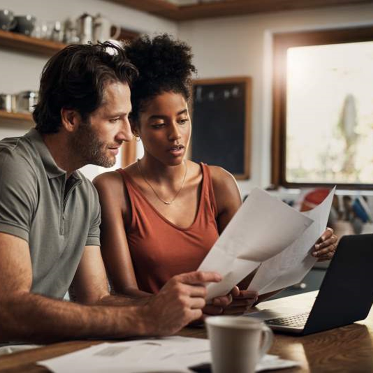 Couple sorting bills