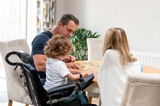 Family doing a jigsaw