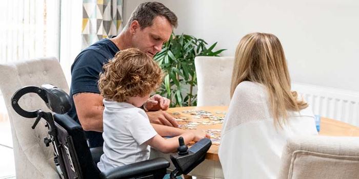 Family doing a jigsaw