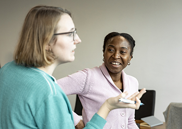 Staff talking to trainer