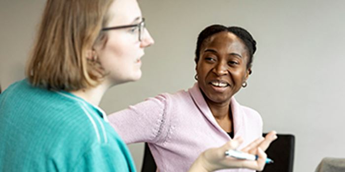 Staff talking to trainer