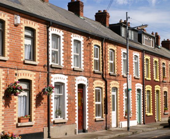 A line of red-bricked terraced houses