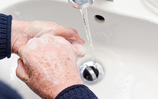 Person washing hands