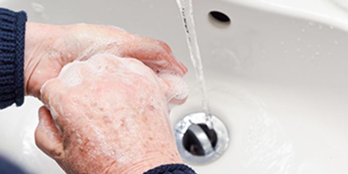 Person washing hands