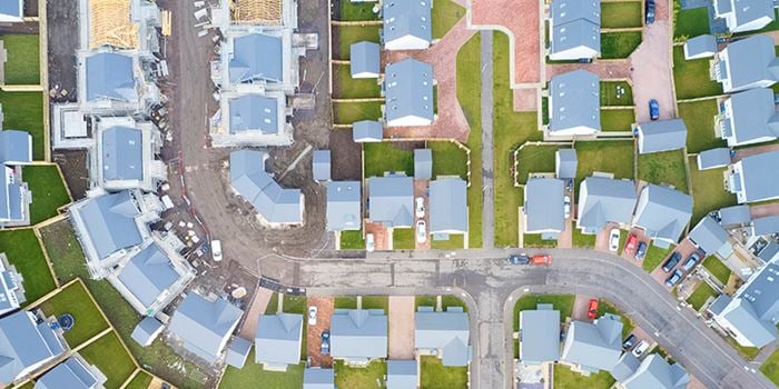 Aerial view of roofs in a housing estate.