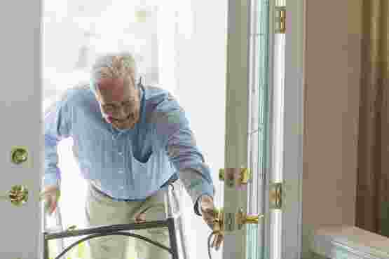 man entering accessible home